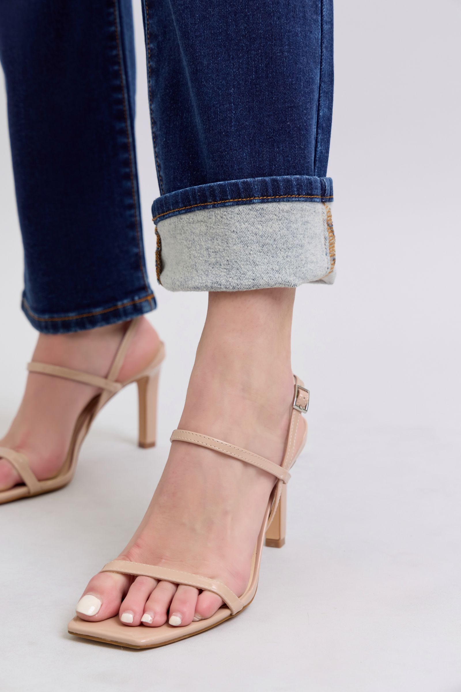 Judy Blue Washed Straight Leg Jeans with Pockets are a practical and fashionable choice for your everyday wardrobe. The washed finish gives them a laid-back and casual feel, while the straight leg cut offers a flattering silhouette. The addition of pockets adds functionality and convenience, making these jeans a perfect blend of style and practicality. Close-up of hem