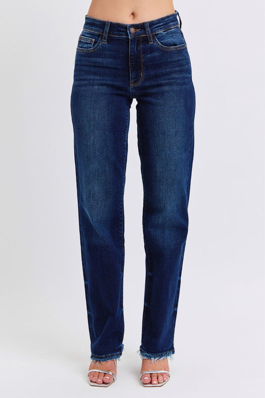 Judy Blue Raw Hem Straight Leg Jeans are a versatile and timeless addition to your wardrobe. The raw hem adds a touch of edge, while the straight leg style offers a flattering silhouette. Perfect for both casual and dressy looks, these jeans are a must-have for any fashion-forward individual. Front view